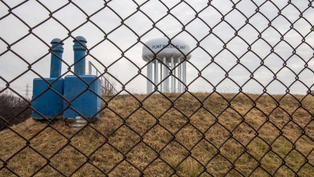 Nearly a decade after the Flint water crisis health impacts became a national warning about government failure, many Flint residents say they are still living with the consequences. Sen. Elissa Slotkin told the U.S. Senate this month that families continue to report health problems and long-term disruption as court cases and settlements continue Sen. Elissa Slotkin took to the U.S. Senate floor last week to deliver a message Flint residents have been repeating for nearly a decade: the crisis may no longer dominate headlines, but the harm has not ended. “An American city was poisoned,” Slotkin said, describing families who reported discolored water, rashes, seizures, hair loss, and chronic health problems as officials insisted the tap water was safe. The Flint water crisis began in April 2014, when the city switched its water source to the Flint River without adding corrosion-control treatment, a safeguard that helps prevent lead from leaching out of aging pipes. Public health officials later warned that tens of thousands of residents were exposed to elevated lead levels, and President Barack Obama declared a federal emergency in January 2016. Health officials say families concerned about lead exposure should follow clinical guidance on testing and follow-up care from the Centers for Disease Control and Prevention. Flint is a majority-Black city with high poverty rates, and the crisis quickly became a national symbol of how infrastructure failures and government neglect can compound longstanding racial and economic inequities. Lead exposure is especially dangerous for children. The Centers for Disease Control and Prevention has warned that lead can damage children’s brains and nervous systems and contribute to learning and behavioral problems—harms that can be irreversible. Research examining pediatric blood lead testing patterns in Flint underscores how the crisis altered health behavior and monitoring, even years after the worst contamination became public. The long road to accountability, including the courtroom While the physical infrastructure is improving, Flint’s search for accountability has played out in courtrooms for years. In a highly watched civil “bellwether” trial in 2022, jurors could not reach a verdict in a case involving engineering firms accused of failing to prevent or mitigate the crisis, leading a judge to declare a mistrial. Since then, major civil settlements have continued to reshape what “justice” looks like for many families—often less about a single guilty verdict than about whether compensation and long-promised services actually reach affected residents. In February 2025, Michigan Attorney General Dana Nessel announced a $53 million civil settlement with Veolia North America tied to allegations that the company’s work contributed to prolonging the crisis; the settlement was described as a way to provide closure after years of litigation. The settlement added to earlier agreements, including the state’s broader $626 million class-action settlement framework meant to compensate people harmed by lead exposure. A court-supervised claims process has approved tens of thousands of claims, but residents have faced long waits as payments move from approval to distribution. The criminal cases tied to the crisis, meanwhile, largely collapsed. A Michigan judge formally dismissed misdemeanor charges against former Gov. Rick Snyder in 2023 after appellate rulings ended the prosecutions, effectively closing that chapter of the legal response. For many Flint families, that outcome deepened the sense that high-level decision-makers escaped meaningful consequences. Health and education impacts also remain a pressing concern. A New York Times report in 2019 described Flint schools struggling with rising needs for individualized education plans and behavioral supports for children who were exposed to lead—needs that educators and parents say require sustained resources, not short-term attention. Separate academic work has linked the crisis to measurable setbacks in educational outcomes, adding to evidence that environmental disasters can shape children’s trajectories long after the immediate emergency fades. There has been visible progress on the city’s pipes. Michigan reported in 2025 that Flint had completed replacement of nearly 11,000 lead water service lines under a legal settlement that required free replacement offers to residents, a milestone that public health leaders framed as nationally significant. Pediatrician Mona Hanna—one of the early voices warning the public about the crisis—told The Washington Post that when water runs through lead pipes, it is “flowing through a straw that is a poison and has no safe level.” Still, Slotkin’s Senate speech captured what many residents say is the unresolved heart of the crisis: trust. She pointed to families who felt dismissed when they first complained, and she said Flint residents are still seeking justice—including through legal action involving federal regulators—while living with the long-term health, educational, and economic consequences of a disaster they did not cause. As Flint marks another year since the emergency declaration, the question for public health and policy leaders is not only how to prevent another Flint, but how to support a community living with the aftershocks—through healthcare access, developmental and educational services, and timely delivery of promised compensation—so that recovery is more than a milestone on paper. Also Read: A New Year, A Fresh Start for Health fyh.news