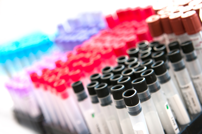 new multi-cancer blood test with an older Black patient during a healthcare visit.